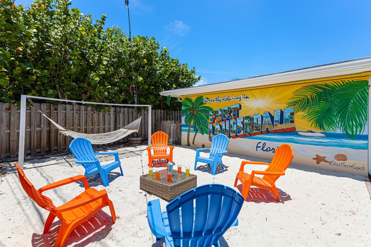 Kick back in cozy Adirondack chairs on your private mini beach.