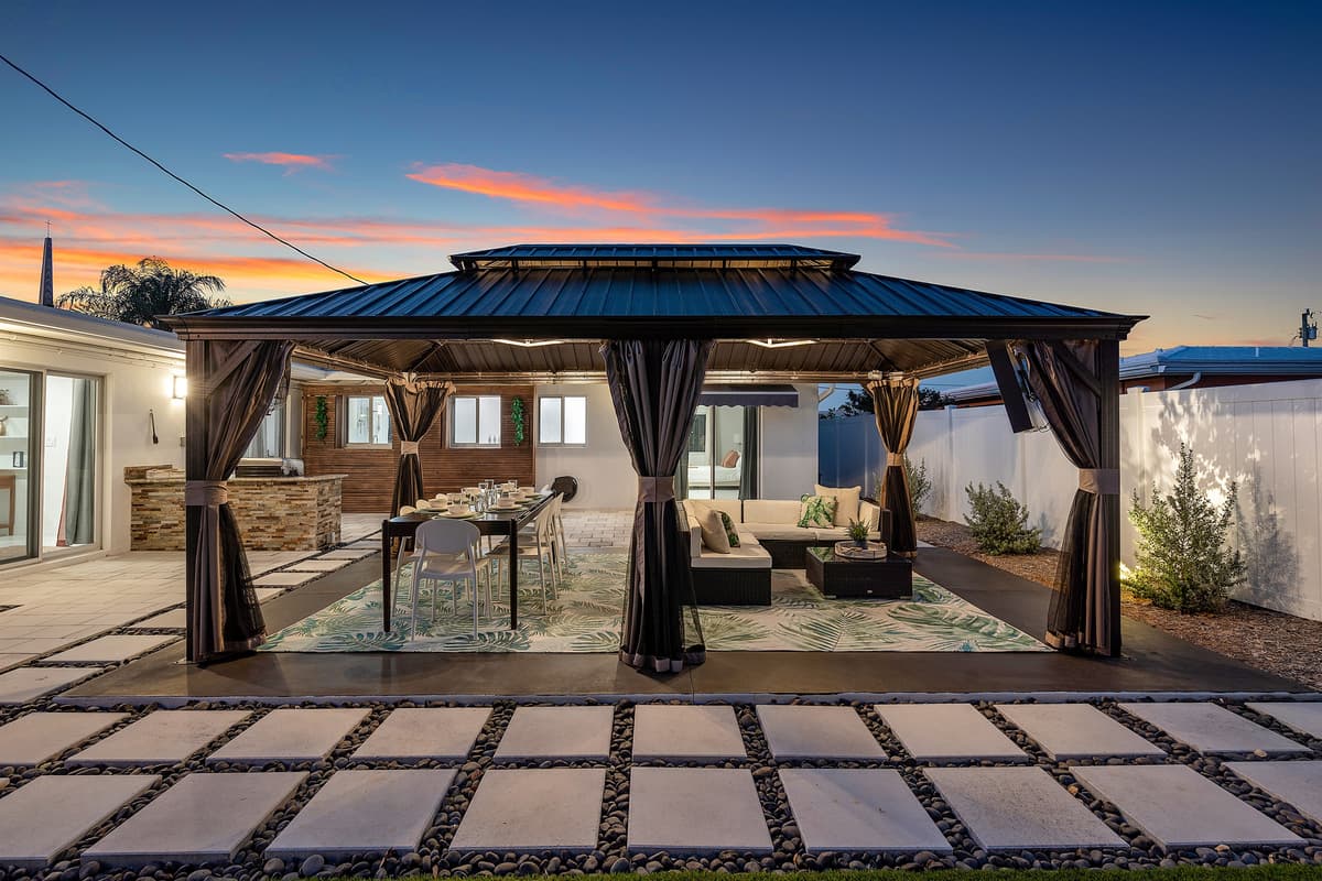 Nighttime magic — backyard lighting transforms the vibe after sunset.