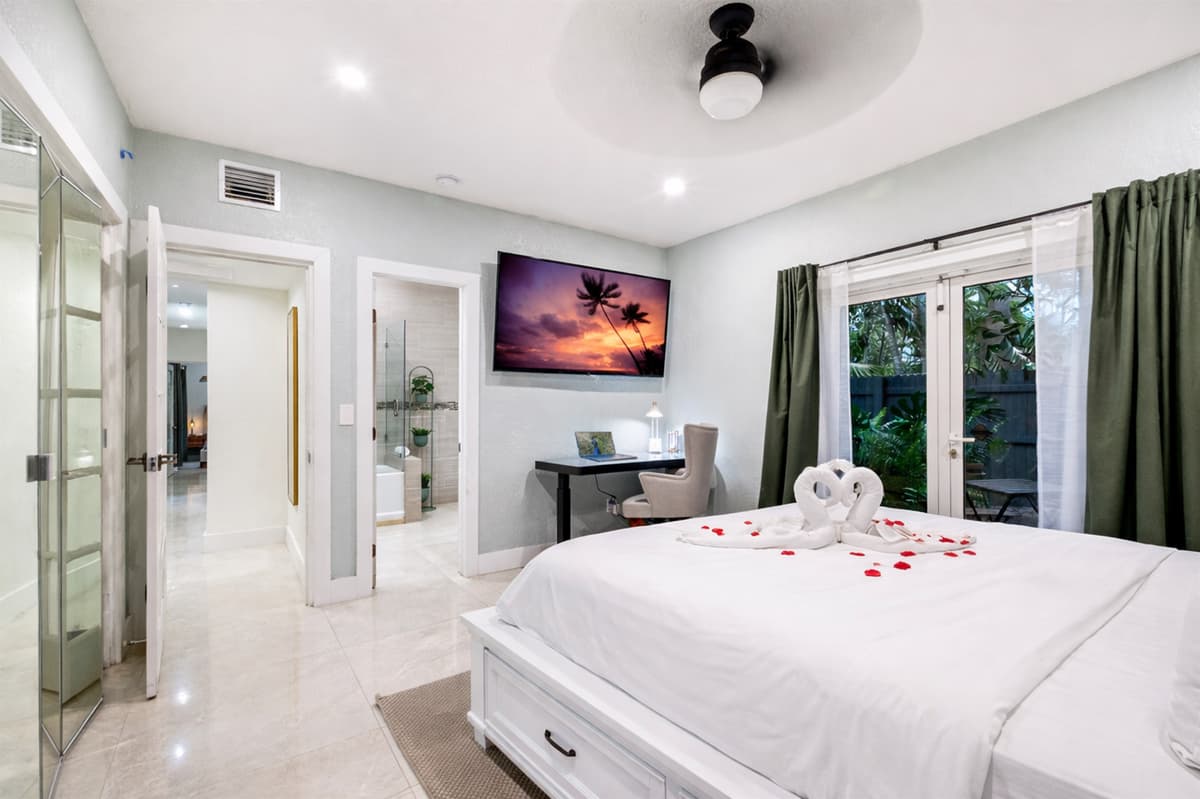 Work if you must, unwind when you’re done — stand-up desk and smart TV in your private suite 💻📺